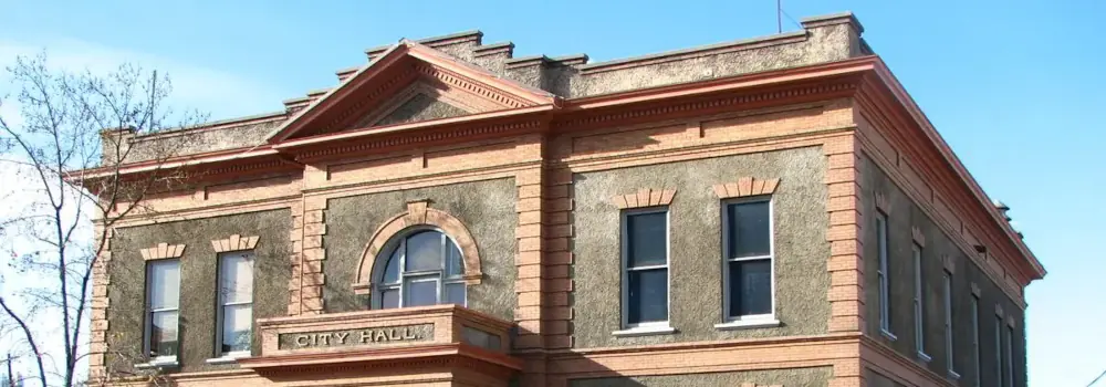 Historic City Hall building with ornate brick and stone facade.